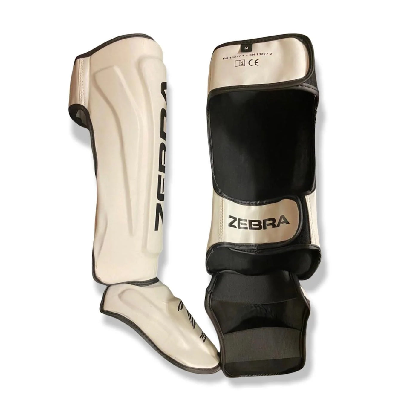 Espinillera ZEBRA PRO Blanca