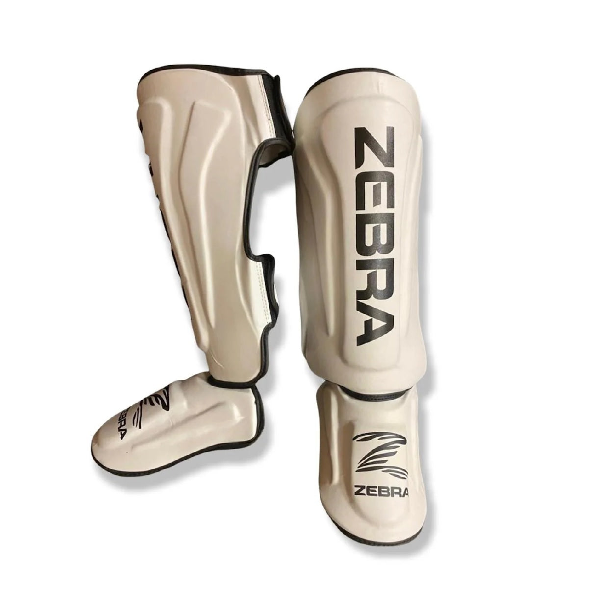 Espinillera ZEBRA PRO Blanca