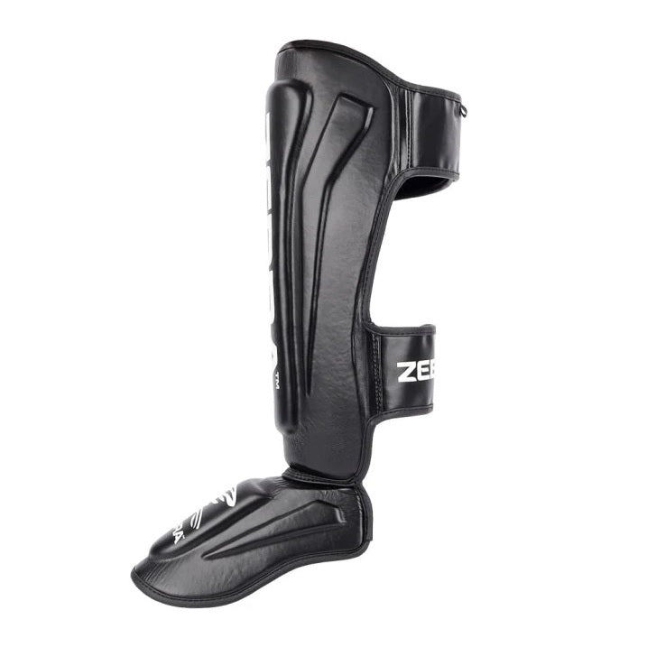 Espinillera ZEBRA PRO Negra