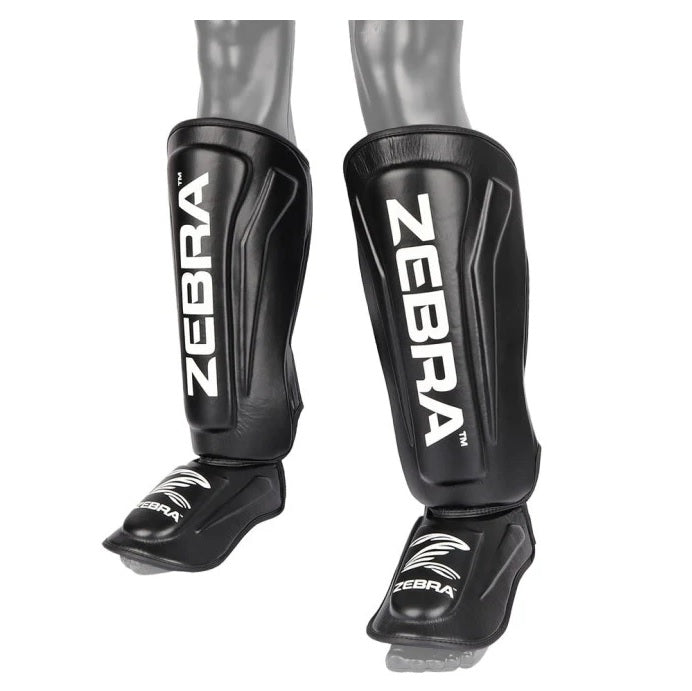Espinillera ZEBRA PRO Negra