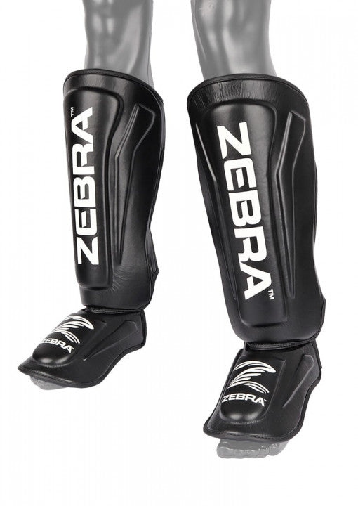 ESPINILLERA ZEBRA PRO NEGRA