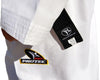 Dobok Taekwondo Protec Inspire cuello blanco bordado en espalda