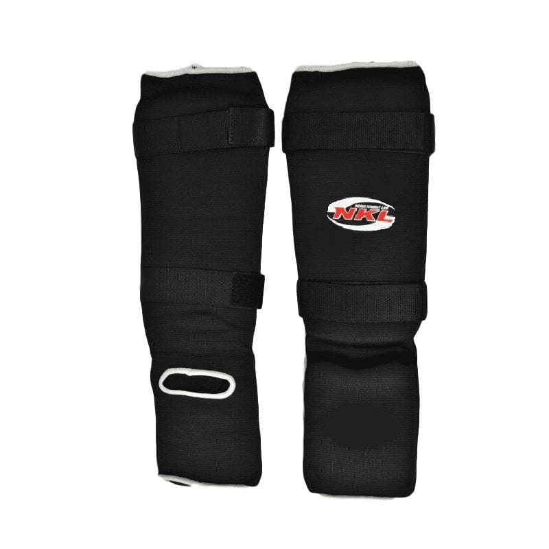 Espinilleras tubulares negras