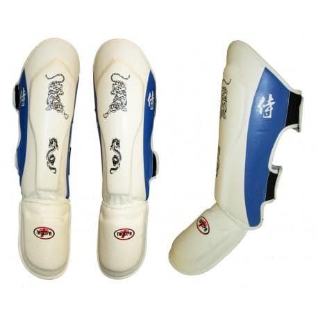 Espinilleras blancas con empeine de gran calidad