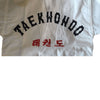 Dobok Taekwondo Protec Inspire cuello negro con Bordado en espalda