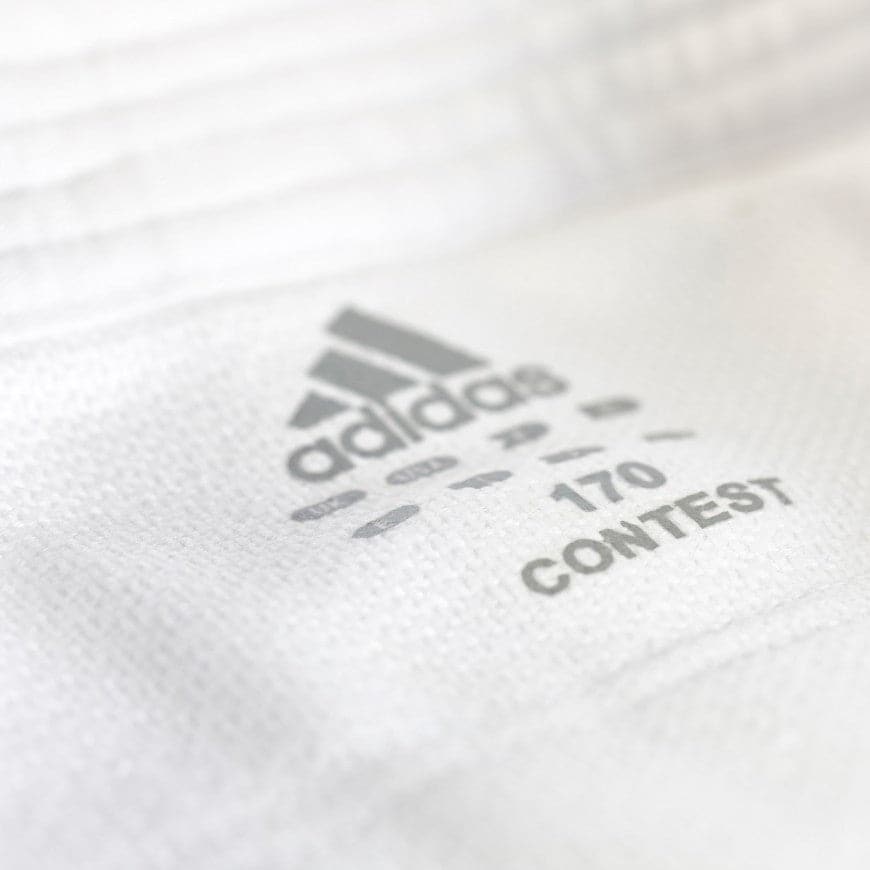 Judogi ADIDAS New CONTEST Blanco 650 gr (Bandas Negras)