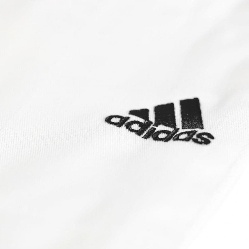 Judogi ADIDAS New CONTEST Blanco 650 gr (Bandas Negras)